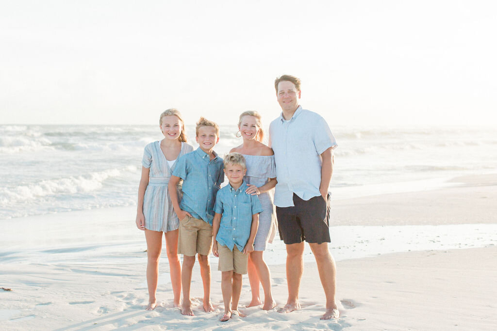 A family photoshoot captured by family beach photography 30A, Kaylie B. Poplin.