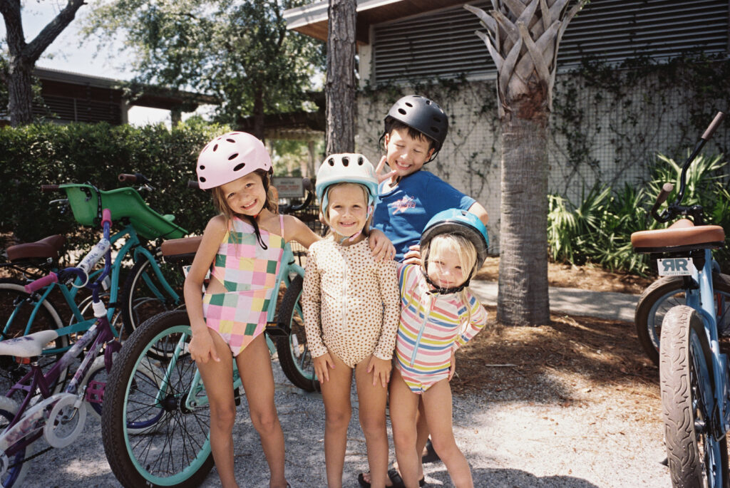 A group of kids riding bikes around port st joe florida on the forgotten coast of florida. 