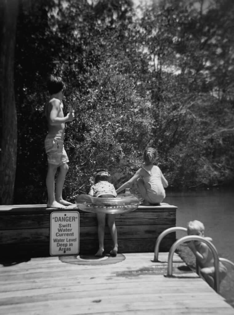 Children playing at Turkey Creek in Niceville, Florida. 