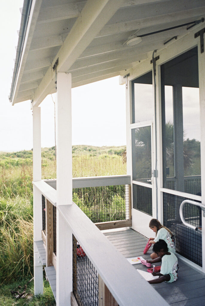 Two kids camping in Cape San Blas State Park.