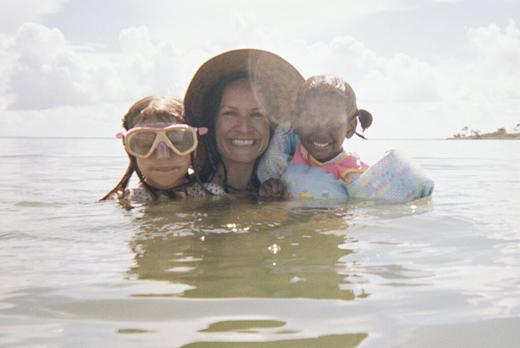 A mother and her kids look for sand dollars in Port St. Joe Florida. 