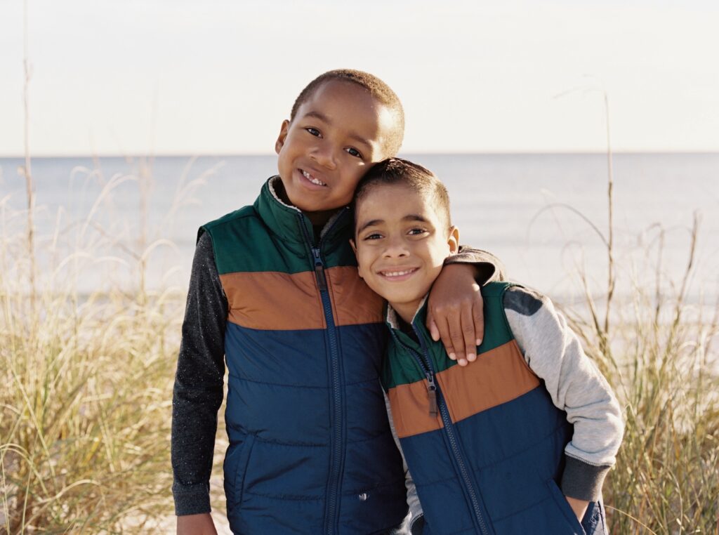 Two brothers pose for their destin family photographer, Kaylie B. Poplin.